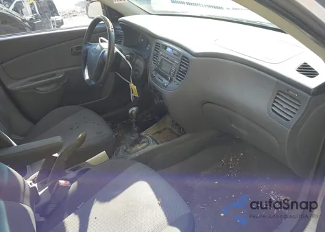 2009 Kia Rio from USA, damaged, VIN KNADE223396561175